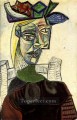 Woman Sitting in Hat 4 1939 cubist Pablo Picasso